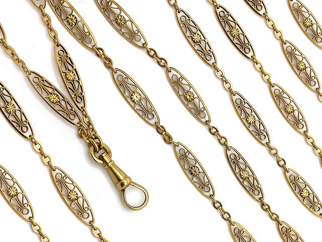 Impressive and rare antique French filigree chain with dog clip, 60" in length.
