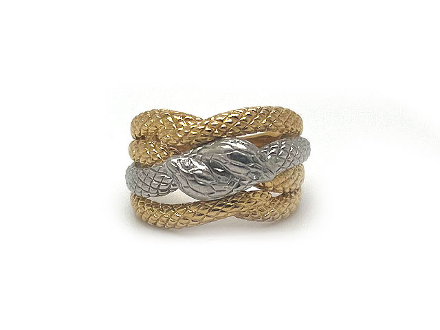 A modern snake ring depicting two coiled snakes in platinum and 18k yellow textured gold.