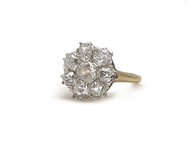 14k antique old mine cut diamond ring in a cluster design. Total Diamond = 2.15cttw.